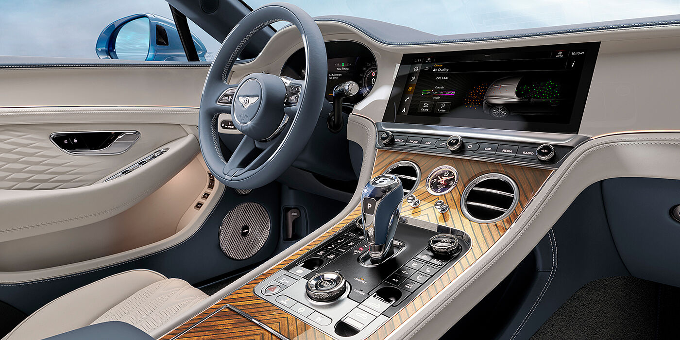 Bentley Dubai New Bentley Continental GTC Azure convertible interior front cabin view with Linen and Brunel hides and Piano Linen by Mulliner veneer featuring centre console and centre MMI screen