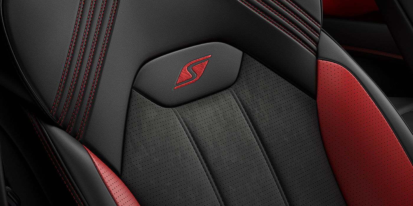 Bentley Emirates -  Dubai Bentley Bentayga S seat with detailed red Hotspur stitching and black Beluga coloured hide. 