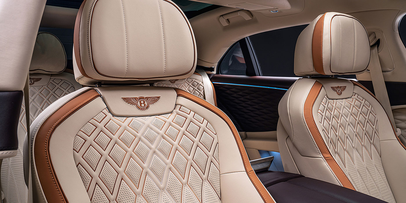 Bentley Emirates -  Dubai Bentley Flying Spur Odyssean sedan rear seat detail with Diamond quilting and Linen and Burnt Oak hides