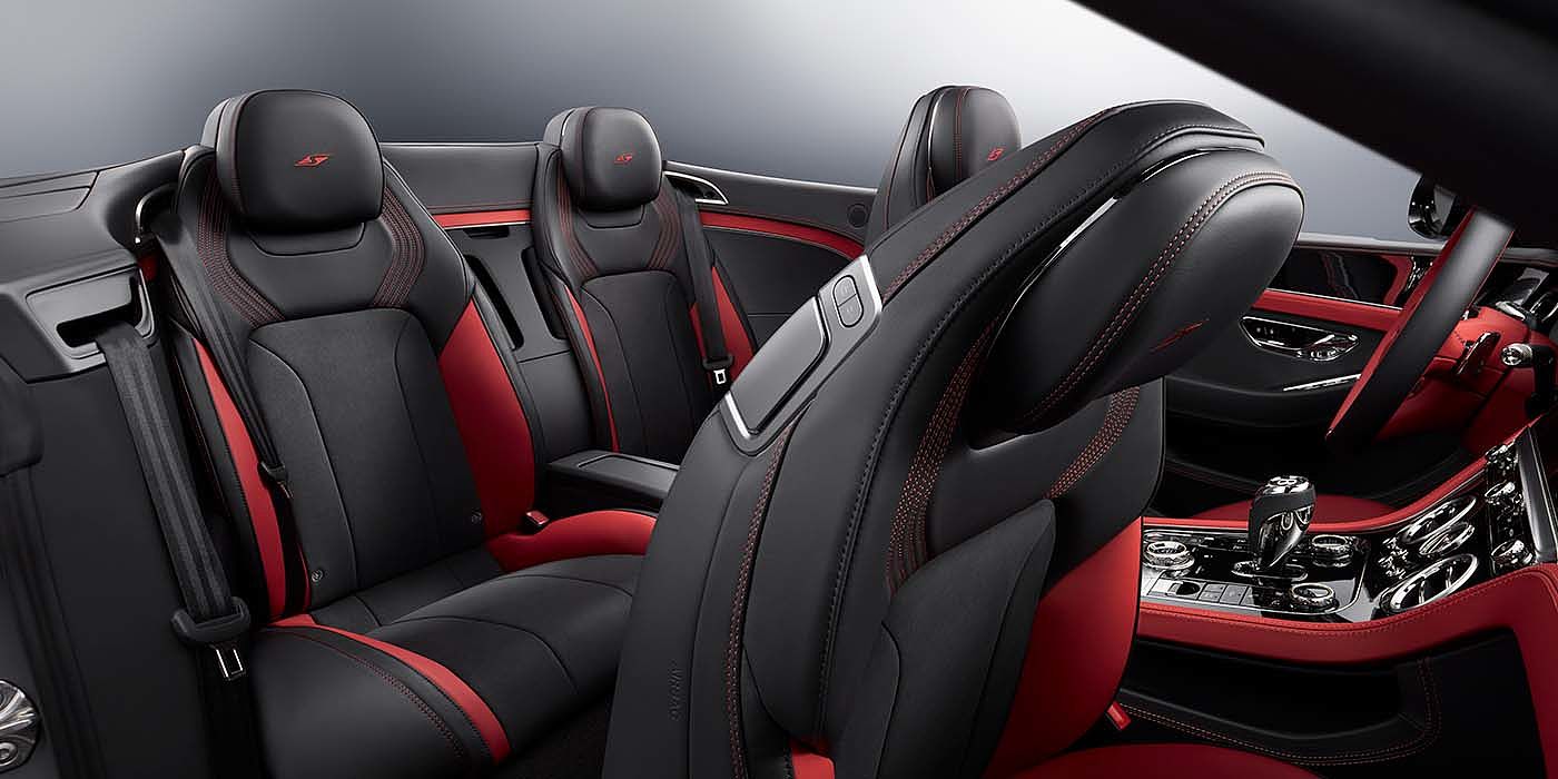 Bentley Emirates -  Dubai Bentley Continental GTC S convertible rear interior in Beluga black and Hotspur red hide