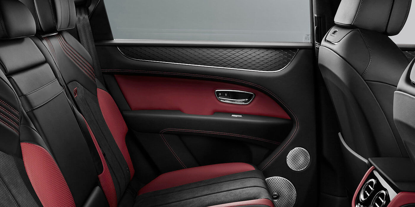 Bentley Emirates -  Dubai Bentley Bentayga S SUV rear interior in Beluga black and Hotspur red hide