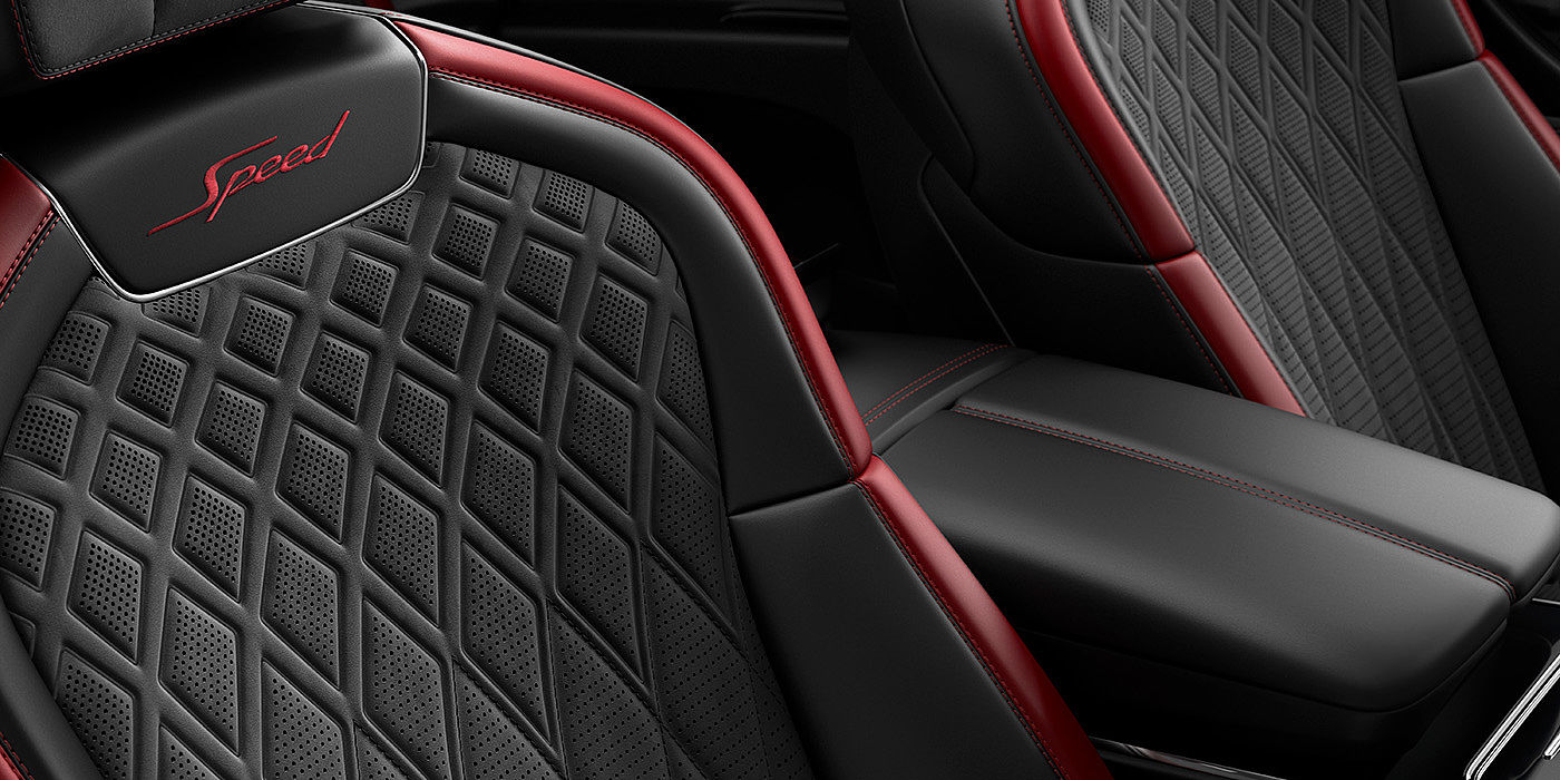 Bentley Emirates -  Dubai Bentley Flying Spur Speed sedan seat stitching detail in Beluga black and Cricket Ball red hide