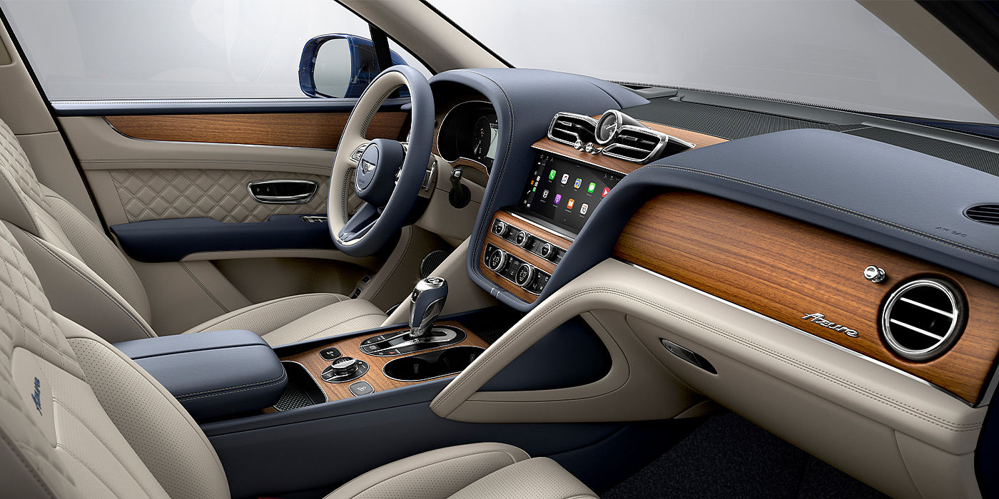 Bentley Emirates -  Dubai Bentley Bentayga Azure SUV front interior in Imperial Blue and Linen hide