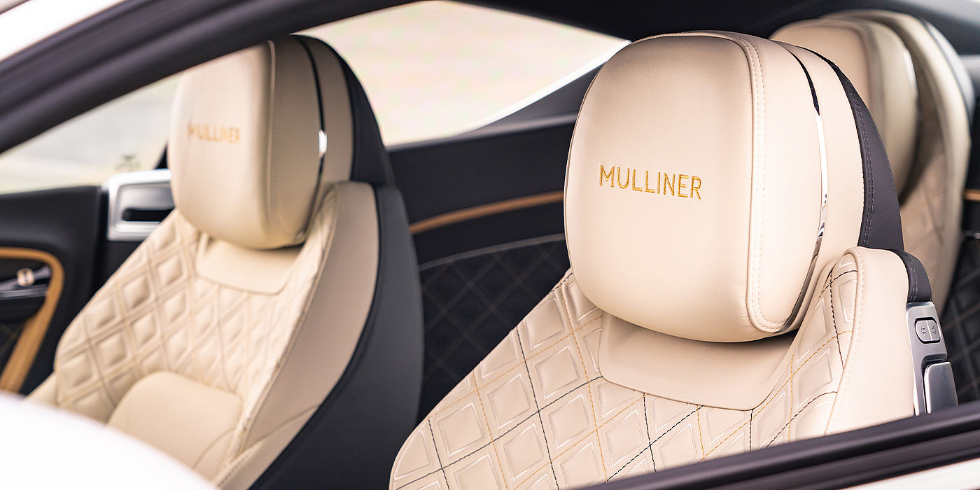 Bentley Emirates -  Dubai Bentley Continental GT Mulliner coupe seat detail in Beluga black and Linen hide