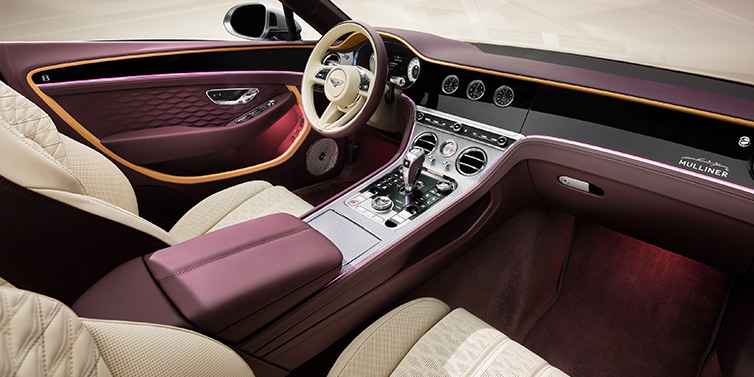 Bentley Dubai Bentley Continental GTC Mulliner convertible front interior including Linen and Damson purple hides and Grand Black veneer